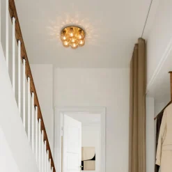 Nuura Apiales 7 plafond - børstet messing / optikk gull