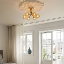 Nuura Apiales 6 taklampe børstet messing / optic gold glass