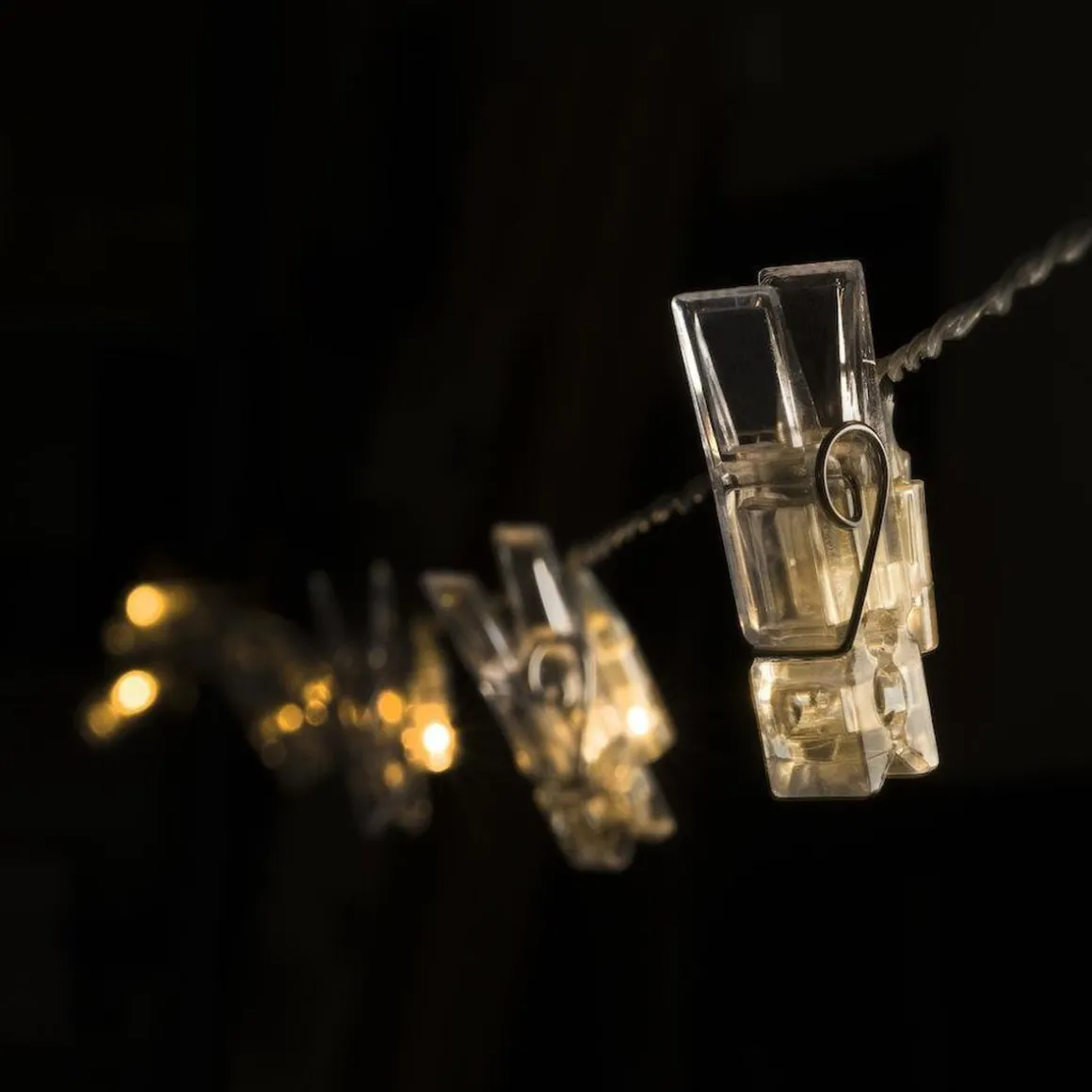 Slynge med 12 LED Fotoklyper